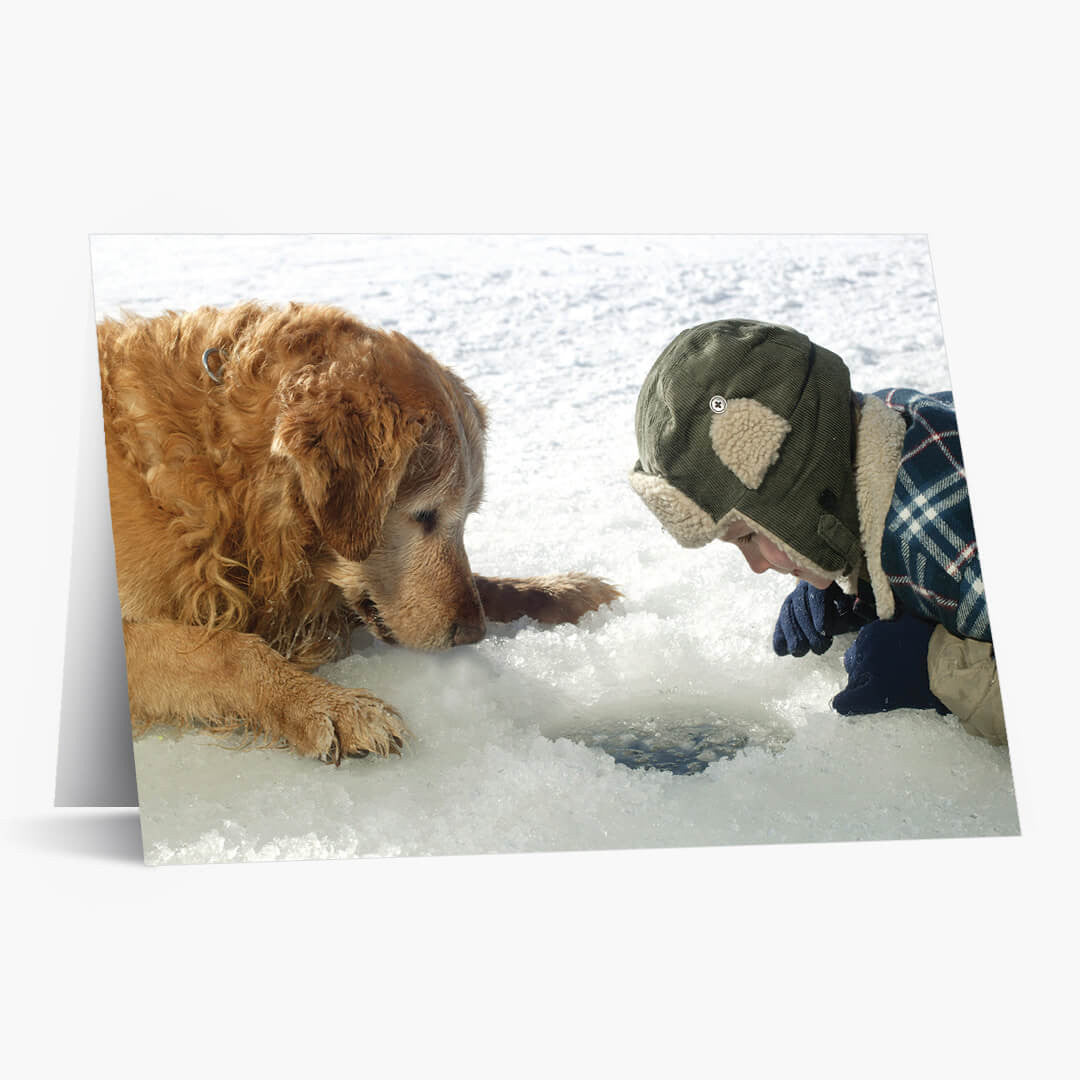 Boy and Dog Ice Fishing Holiday Card